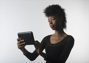 Young woman with digital tablet.