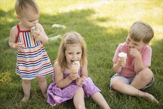 Children (18-23 months, 2-3, 4-5) eating ice-cream