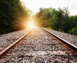USA, Maine, Knox, Railroad track at sunset