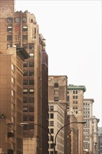 USA, New York State, New York City, Skyscrapers along street