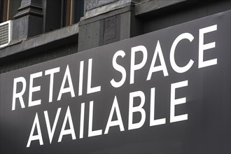 Close-up view of rental sign on building facade
