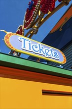 Sign at entrance to amusement park on Coney Island