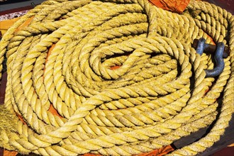 Coil of yellow rope with hook