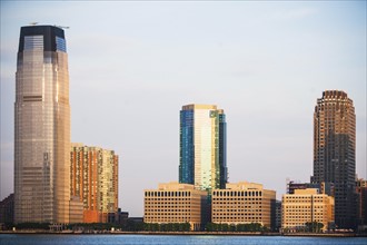 USA, New Jersey, Jersey City, City skyline seen across Hudson River