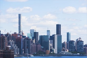 USA, New York State, New York City, Manhattan, City panorama seen across East River