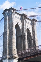 USA, New York State, New York City, Brooklyn bridge detail with American flag on top