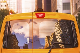 USA, New York State, New York City, Manhattan, Rear view of yellow cab