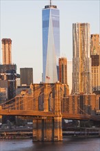 USA, New York State, New York City, Manhattan, Cityscape with Brooklyn Bridge at sunrise