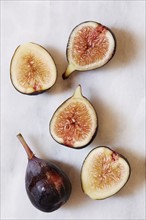 Figs lying on marble table