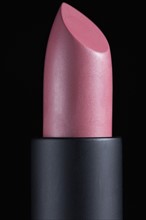Lipstick against black background