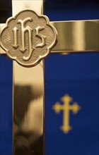 Close-up of gold cross.