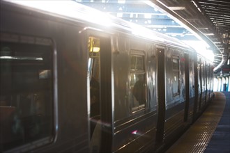 USA, New York, New York City, Subway train at station