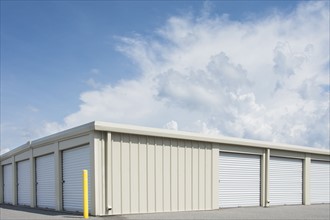 Blue sky over distribution warehouse
