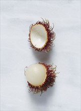 Rambutan (Nephelium lappaceum) fruit against white background