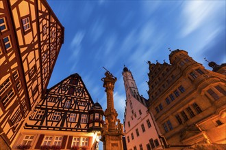Germany, Bavaria, Rothenburg, Low angle view of half-timbered houses at Market Square