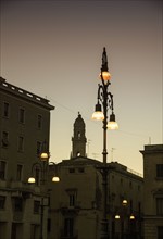 Italy, Puglia, Lecce, Houses in old town at dusk