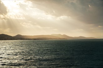 Croatia, Ugljan island, Sunbeams shining on sea surface