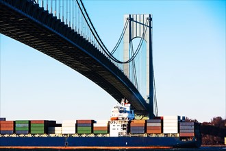 USA, New York State, New York City, Cargo ship under verrazano narrows bridge