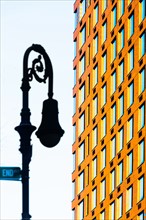 USA, New York State, New York City, Detail of lamp post and office building