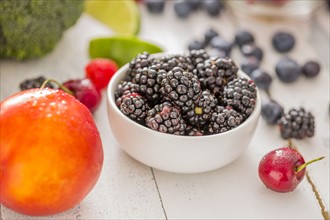Nectarine and blackberries in bowl