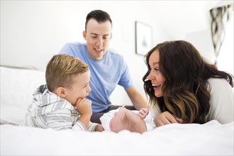 Parents son (4-5) and daughter ( 1 month) in bedroom