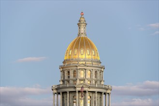 USA, Colorado, Denver, Full moon rising next to State Capitol dome