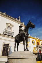 Spain, Seville, Equestrian statue of Augusta Senora Condesa de Barcelona in front of Plaza de Toros