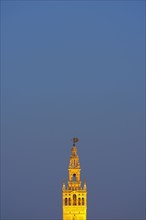 Spain, Seville, Tower of Giralda at dusk