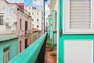 Cuba, Havana, Building terrace with turquoise doors