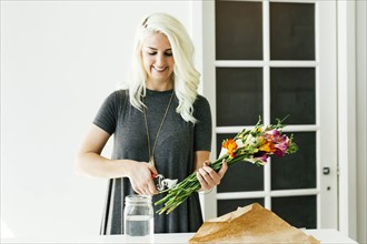 Woman cutting bouquet
