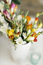 Bouquet in vase on table