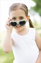 Portrait of girl (4-5) wearing sunglasses