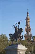 Spain, Seville, Plaza De Espana, Equestrian statue and tower