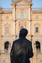 Spain, Seville, Plaza De Espana, Silhouette of male statue with building in background