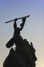 Spain, Seville, Avenida Portugal, Silhouette of equestrian statue