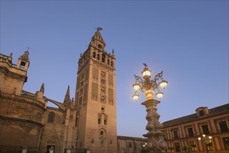 Spain, Seville, Giralda Tower at dusk