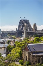 Australia, New South Wales, Sydney, Cityscape and bridge over harbor