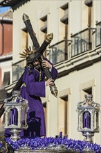 Spain, Andalusia, Granada, Plaza Nueva, Statue of Jesus Christ carrying cross during Stations of Cross