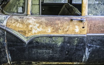 Rusty abandoned car