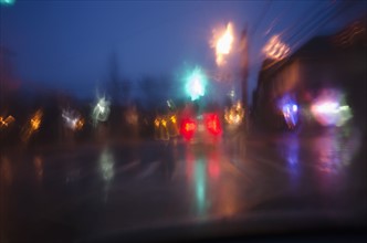 Street traffic at rainy night