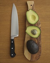 Studio shot of avocado on cutting board for guacamole
