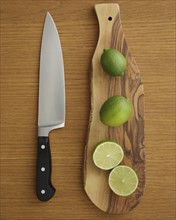 Studio shot of lime on cutting board for guacamole