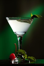 Martini cocktail with mint leaf