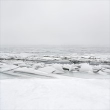 Ukraine, Dnepropetrovsk region, Dnepropetrovsk city, Frozen river with lumps of ice