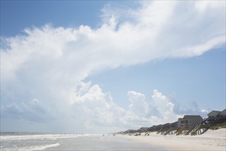 USA, North Carolina, Topsail Island, Clouds above sea and sandy beach