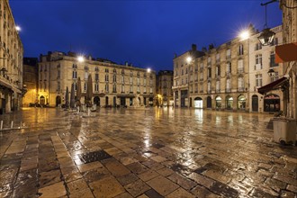 France, Nouvelle-Aquitaine, Bordeaux, Wet Parliament Square at night