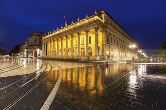 France, Nouvelle-Aquitaine, Bordeaux, Grand Theatre de Bordeaux at night in rain