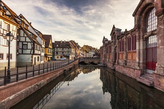 France, Grand Est, Colmar, Sky reflecting in water surface