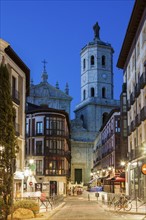 Spain, Castile and Leon, Valladolid, City street with Cathedral of Valladolid in background