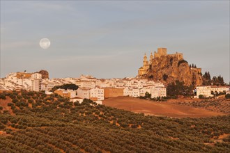 Spain, Andalusia, Olvera, Townscape with moonrise
